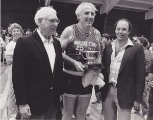 Milton Kutsher (left) hosted the “Stokes Benefit Game” at his resort in the Catskills each August from 1959 to 1999.  Kutsher reached out to Twyman (center) in late 1958 and asked how he could help Maurice.  Kutsher’s son, Mark Kutsher (right), continued this tradition after his father died.  Following Stokes’ death in 1970, proceeds from the benefit game went to NBA players who needed financial help because of an unforeseen medical crisis (Saint Francis University Marketing and Public Relations).